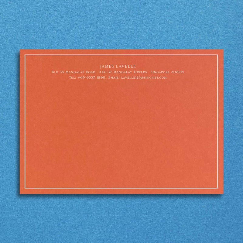 Bellevue correspondence cards shown on a Mandarin orange card and printed in white ink with a keyline border