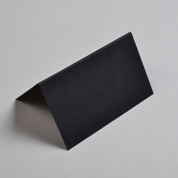 The Black tent folded place cards are softly textured colorplan Ebony stock