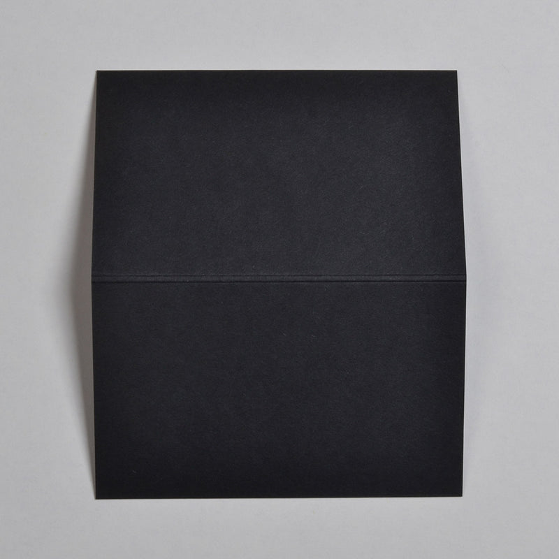 The Black wedding place cards show top down