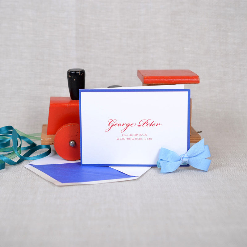 The Branson personalised new baby cards, showing the font in red and contrasting blue borders