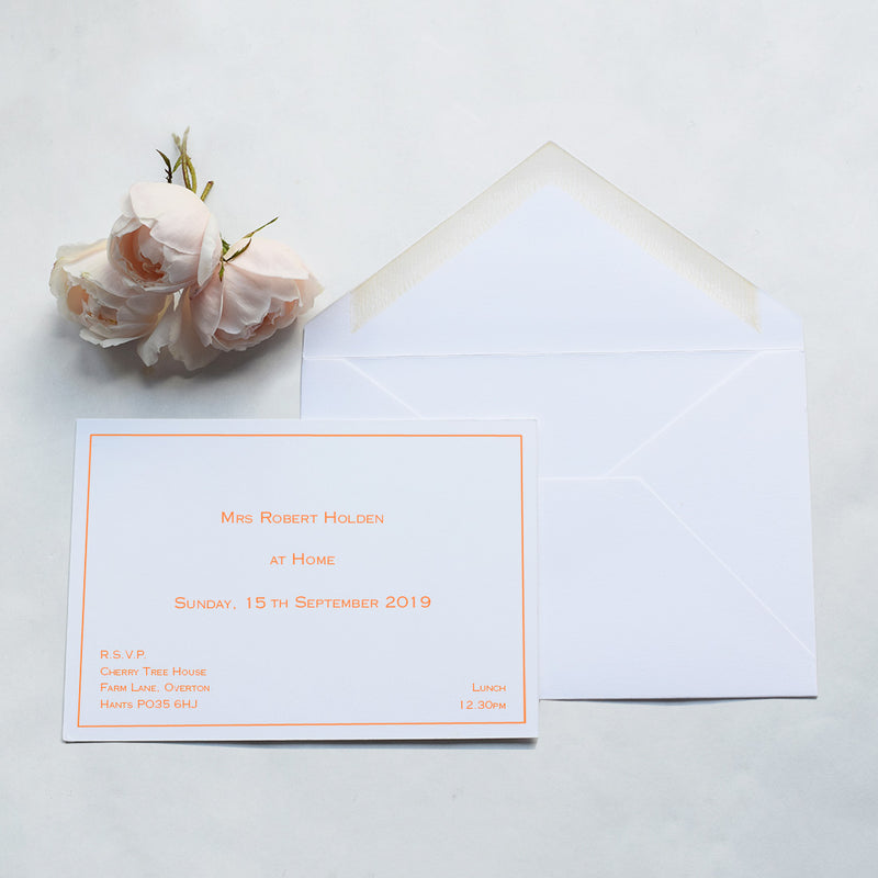 The Brideshead at home invitation cards, print in orange with a keyline border and sans serif font