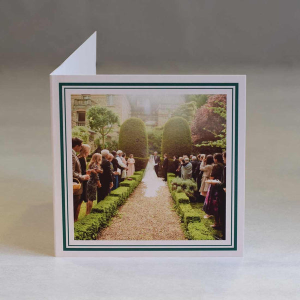 a square folded photo thank you card showing a double keyline border framing the photo