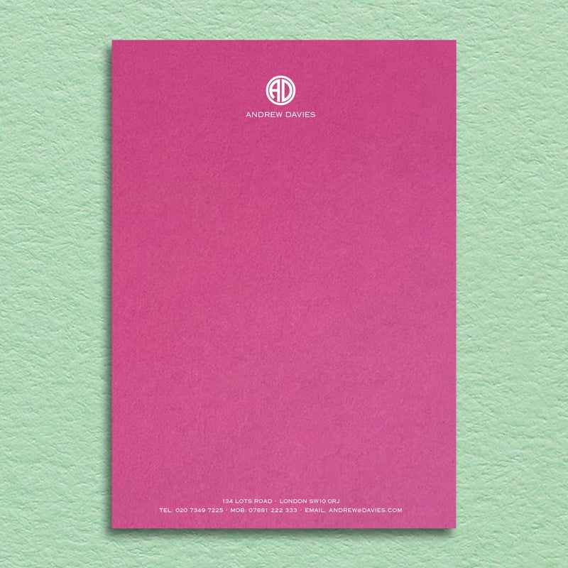 Bronte writing paper displays a contemporary monogram at the head and details at the foot, printed in white ink onto a fuchsia pink sheet
