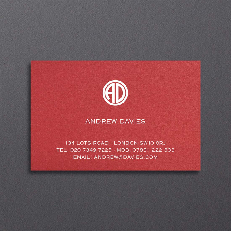 A bold red card provides the perfect backdrop for this contemporary design