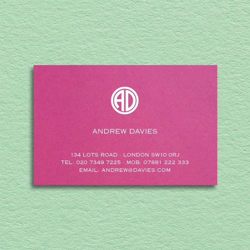 A punchy pink card provides the perfect backdrop for this contemporary design