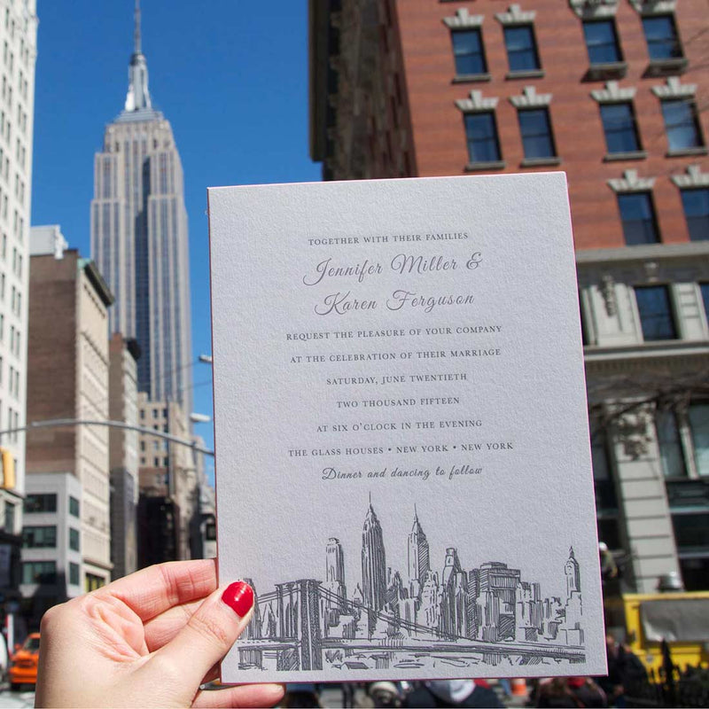 The Brooklyn wedding invitations show a skyline print of NYC, and is held against the backdrop of the city itself
