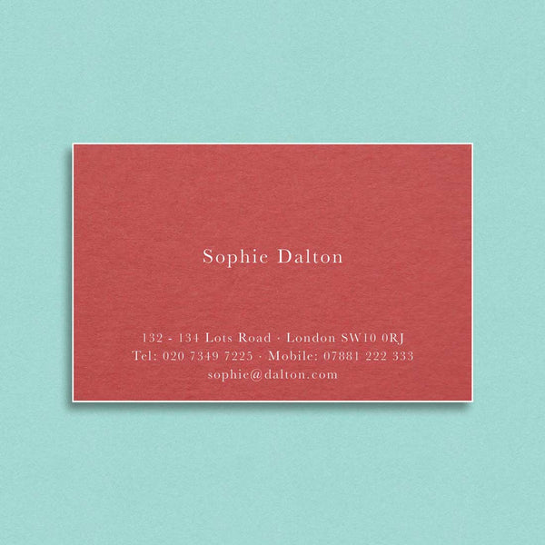 Engraved in white ink onto a contrasting vermillion card, the Buckingham visiting cards are finished with white edges