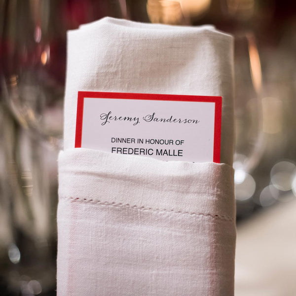 The Burlington menu is personalised at the head, showing the guest's name above the crease of the napkin