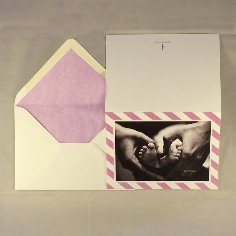 The charlotte personalised baby girl card and lilac tissue paper lined envelope to match the border colour