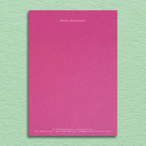 An elegant writing paper design printed in white ink onto a fuchsia pink sheet