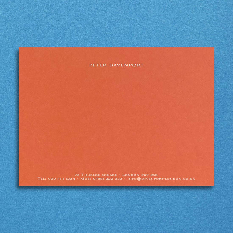 a simple and elegant format printed in white ink onto a mandarin orange card means that these correspondence cards leave a lasting expression