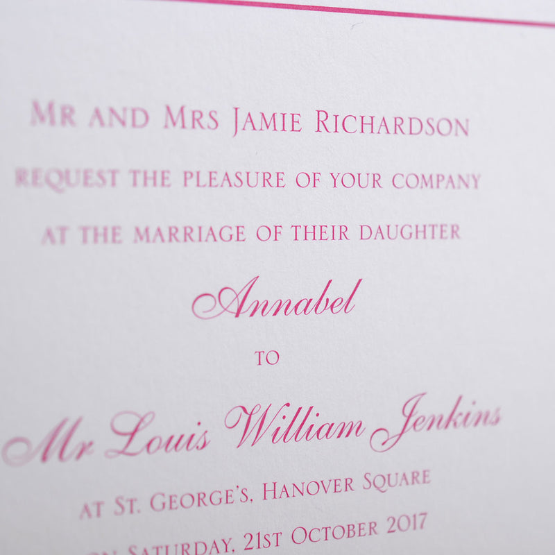 a close up of the Curzon wedding invitation text, printed in shocking pink onto white card