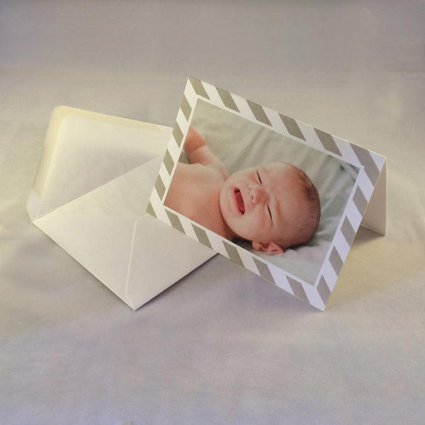 The Daniel baby boy thank you cards, showing neutral grey stripes borders which complement the tones of the picture