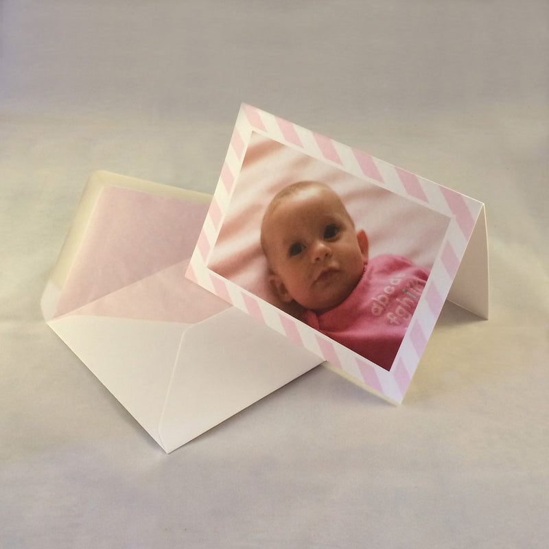 The emily baby photo thank you cards, showing baby pink striped borders which complement the colours in the picture