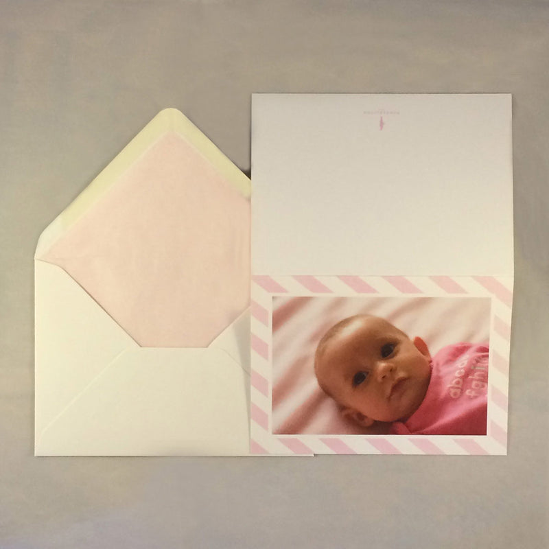 The charlotte personalised baby girl card and soft pink tissue paper lining to complement the border colour