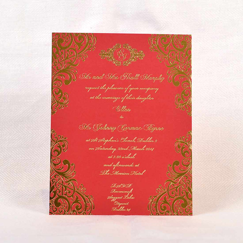 a face on photo of the fitzwilliam foiled wedding invitation, shining gold printed onto red card with an elaborate frame