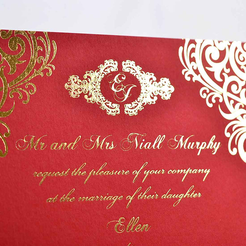 a close up of the intricate monogram which sits at the head of the fitzwilliam foiled wedding invitation