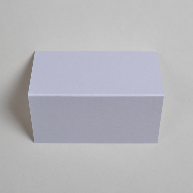 The Ivory wedding place cards show top down
