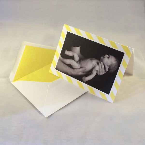 The Jacob baby boy thank you cards, showing sunshine yellow striped borders which complement the tone in the picture
