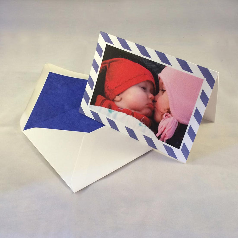 The James baby boy thank you cards, showing dark blue striped borders which complement the tone in the picture