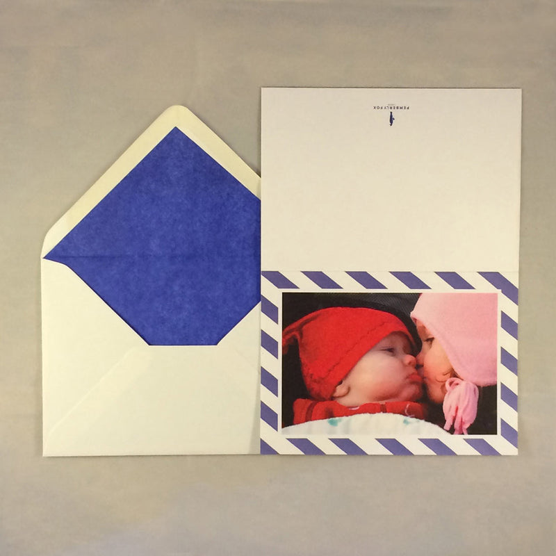 The James luxury baby boy cards with dark blue tissue paper lined envelope to complement the border colour
