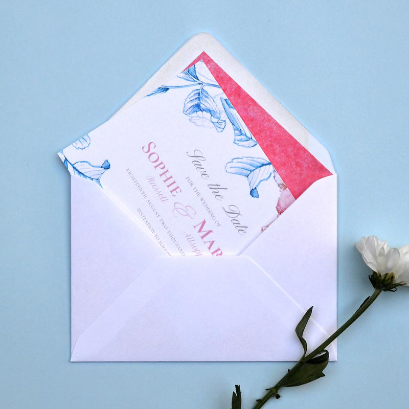 The Kew save the date card with Island pink tissue lining in the envelopes