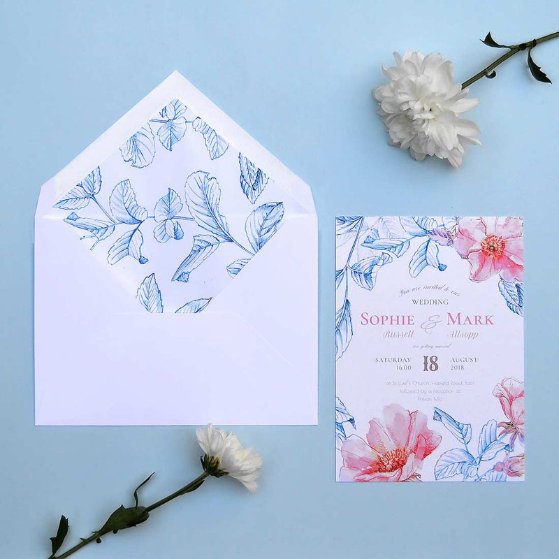 The Kew wedding invitation, uses bold blooms and foliage as decoration and comes with matching printed paper lined envelopes