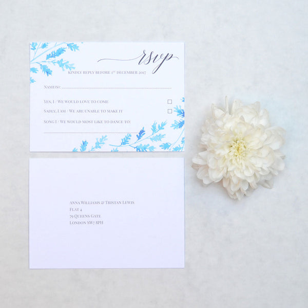 The Lillehammer wedding RSVP card is printed both sides, with ice blue floral designs framing the reply details