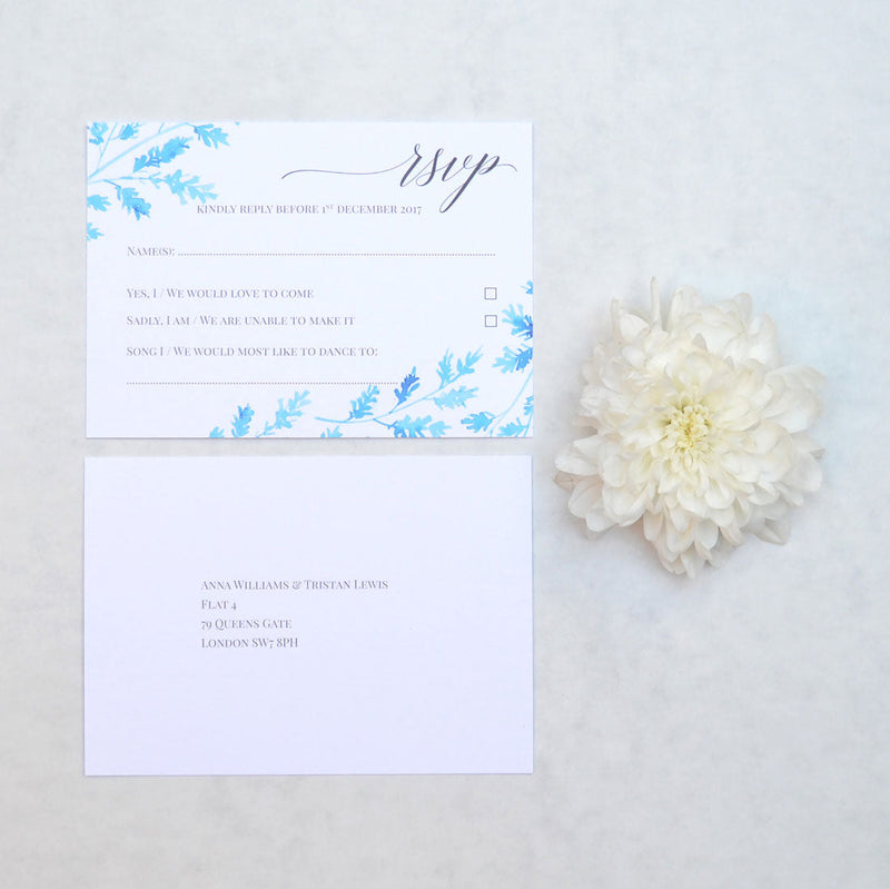 The Lillehammer wedding RSVP card is printed both sides, with ice blue floral designs framing the reply details