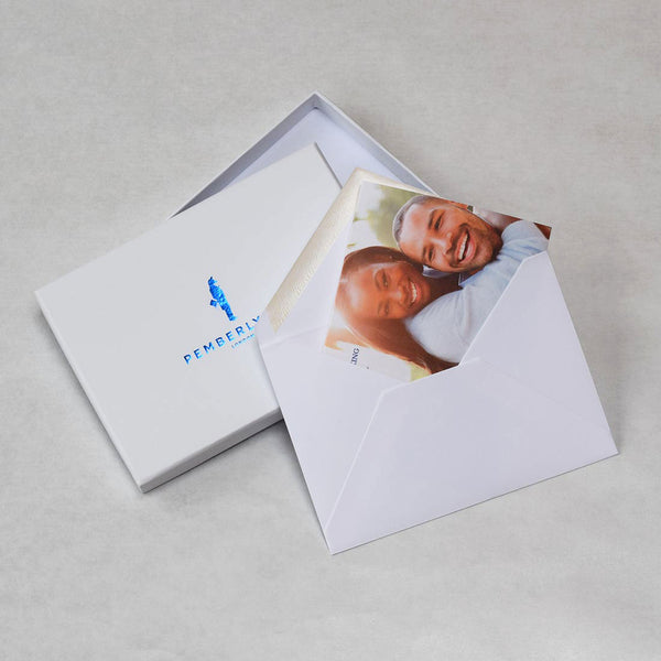 The Marbella Wedding photo thank you cards with their envelopes and our branded box