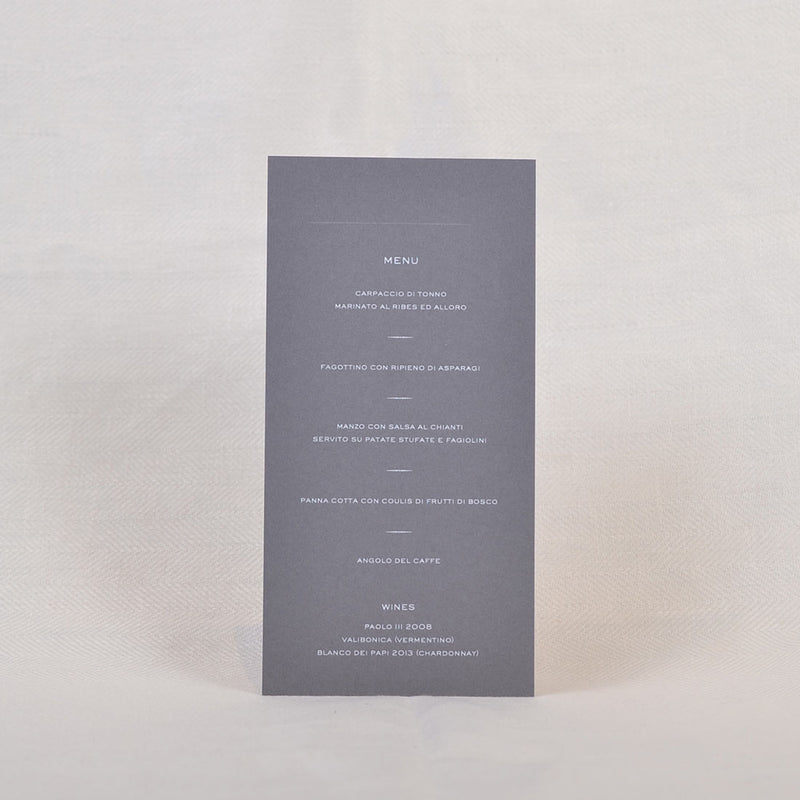 The Milan wedding breakfast menu cards showcase a white foiled text on a tall and thin grey 540gsm Colorplan card