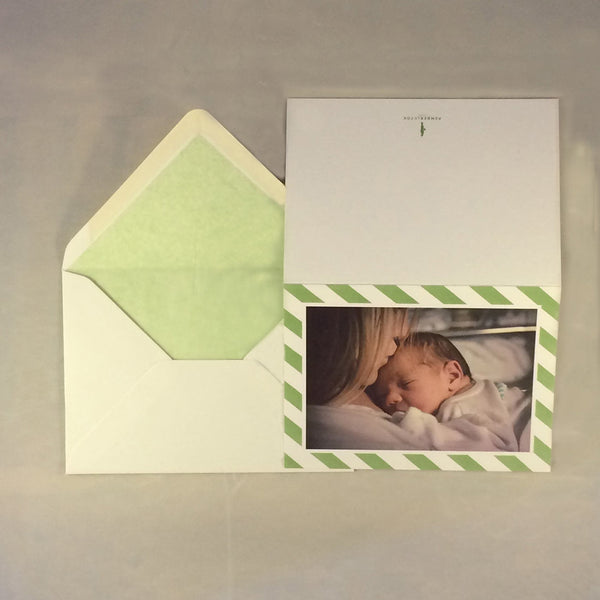 The olivia personalised baby girl card and sage green tissue paper lining to complement the border colour