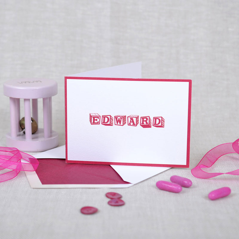 The Palfrey personalised new baby cards, showing a a red baby blocks font with matching border