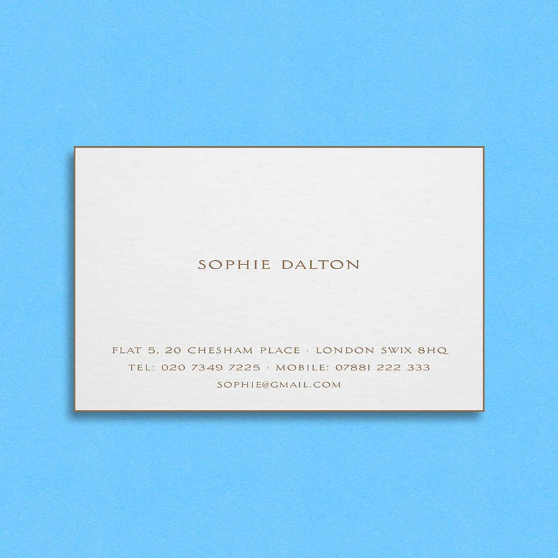 The Rose visiting cards show the text engraved in gold with matching foiled edges on a white card