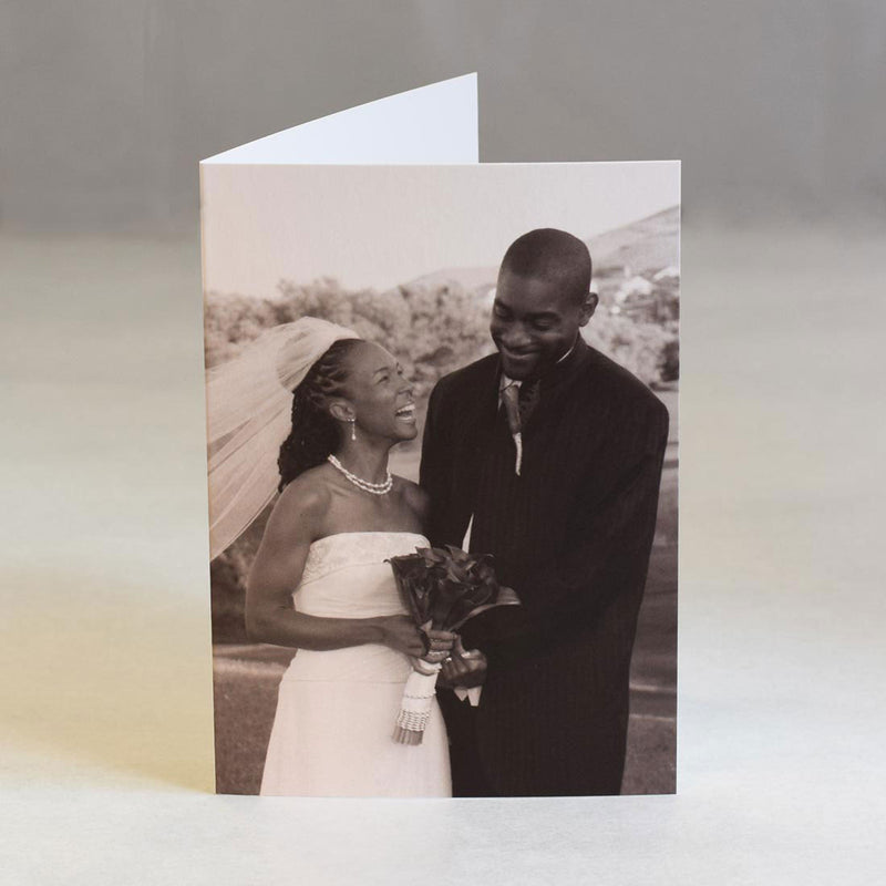 A black and white portrait photo occupies the whole fron page of the Santa Fe wedding photo thank you cards