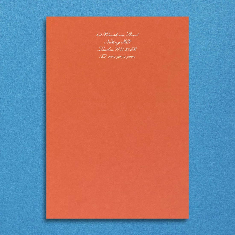 Stylish and simple, your contact details print in red at the head in white ink onto a bright orange sheet