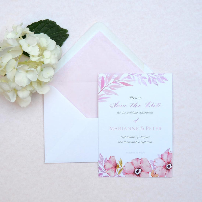 The Sherborne wedding save the date with light pink tissue lined envelopes