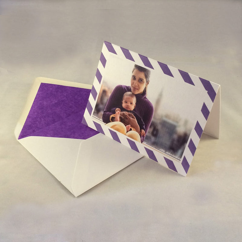 The Simon baby boy thank you cards, showing lovely purple striped borders which complement the tone in the picture