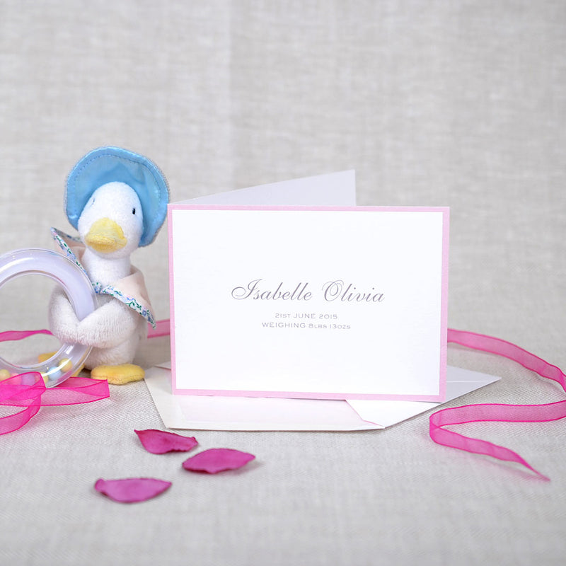 The Spencer personalised new baby cards, showing a grey font and baby pink border