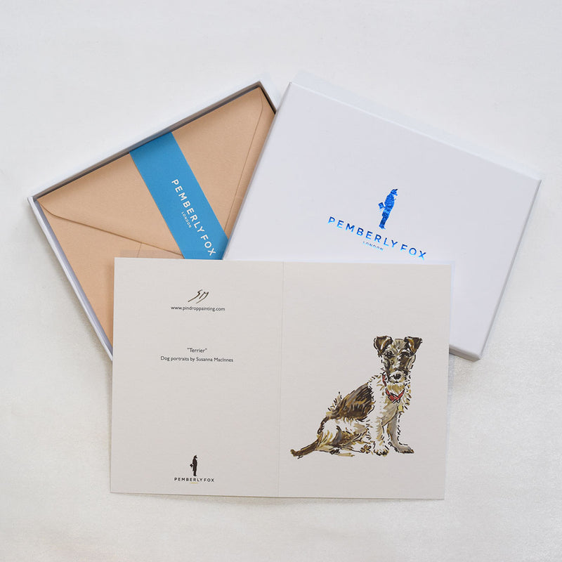 the terrier dog greeting cards shown here with the accreditation to designer susie macinnes on the back