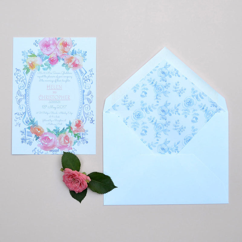 The Walsingham Wedding invitation uses an ornate rose frame around the text, supplied with paper lined envelopes