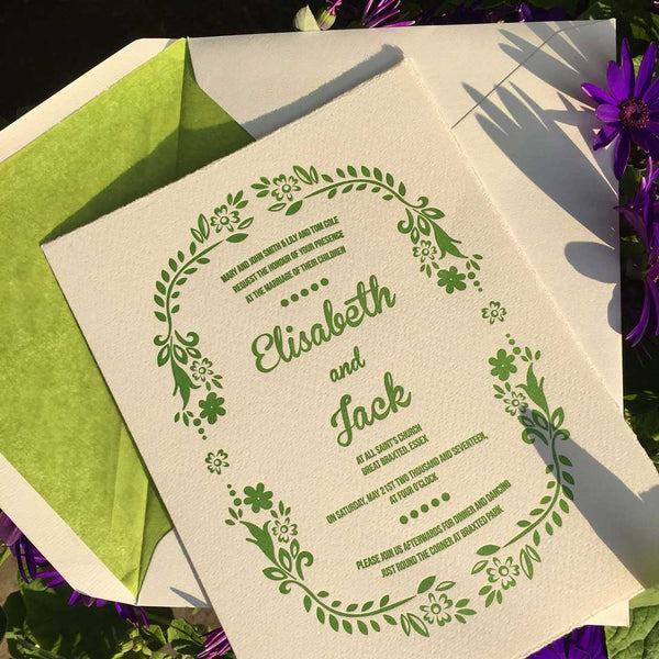 The Willow letterpress wedding invitation, printed in grass green paper with matching tissue paper lined envelopes