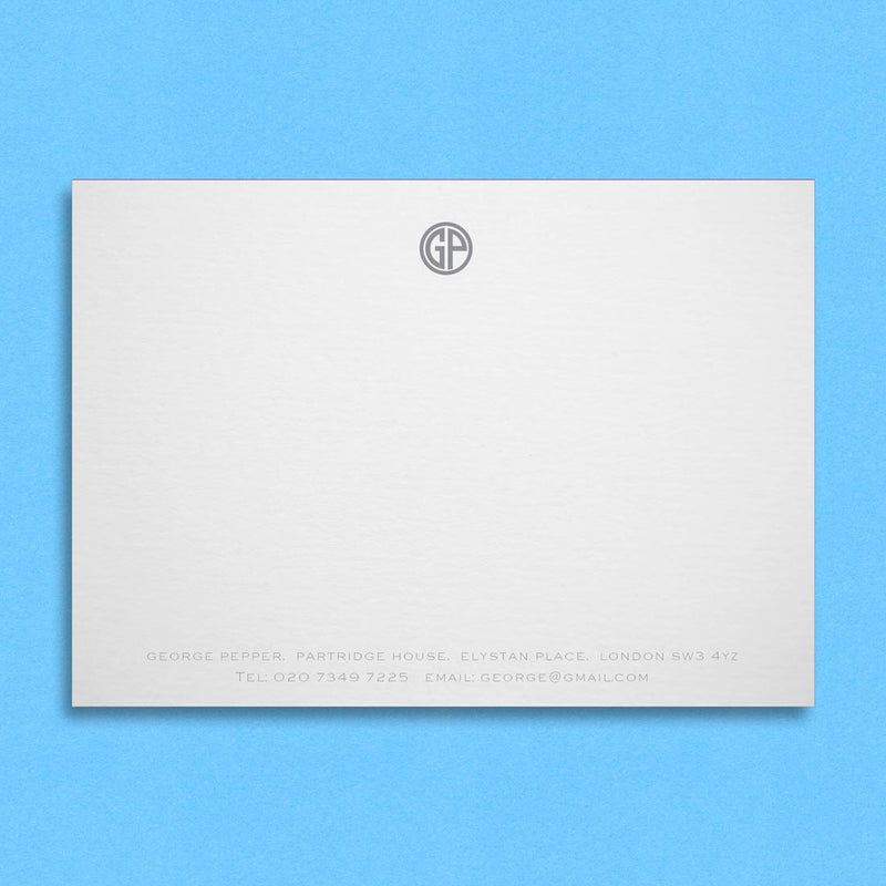 The Baron embossed note cards include a circle monogram and contact details at the foot in one colour