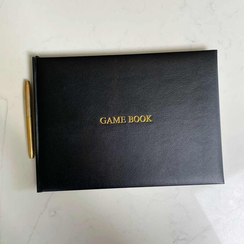Pemberly Fox's black leather game book can be personalised with gold embossed initials