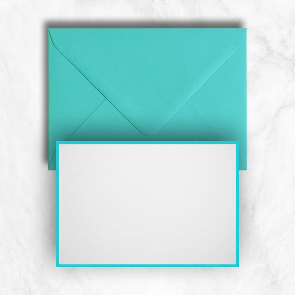 A gorgeous turquoise border frames this white card and comes with matching envelopes