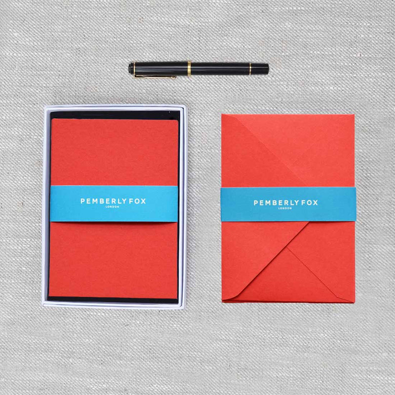 Bright read correspondence cards and envelopes