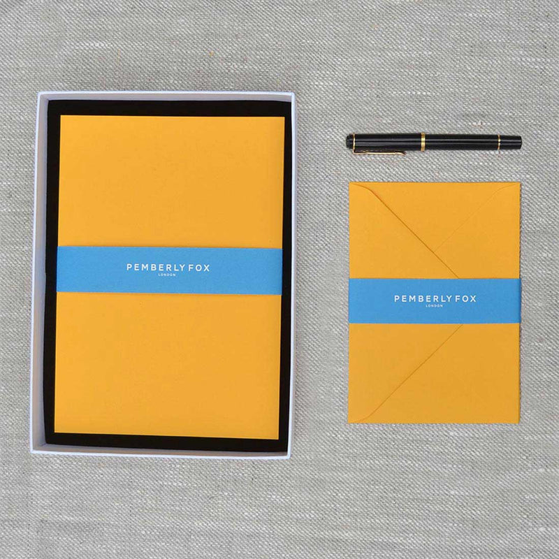 The citrine a5 writing paper and envelopes are a bright sunshine yellow and sold in a branded Pemberly Fox box.