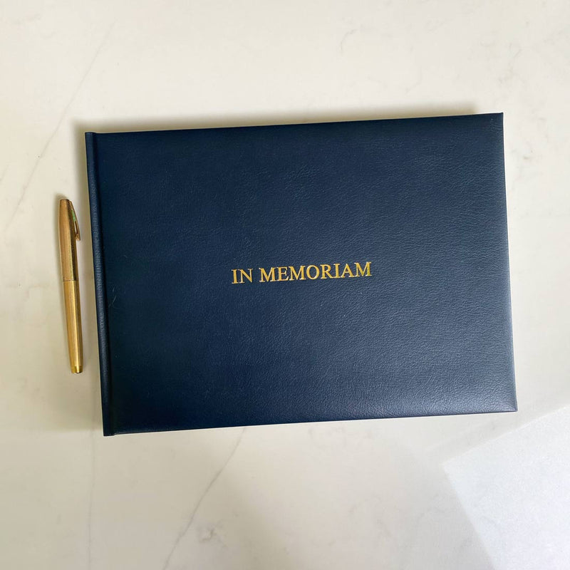 Pemberly Fox supplies a beautifully bound blue leather condolence book