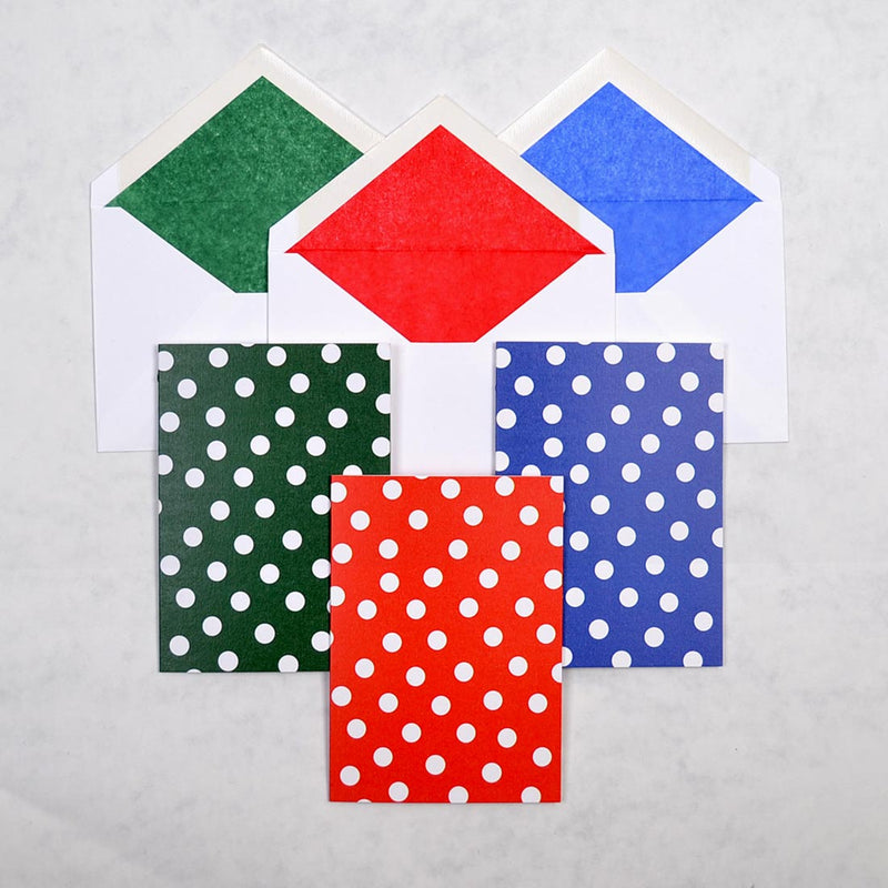 the dotty polka dot greeting cards shown on portrait cards, with matching tissue paper lined white envelopes