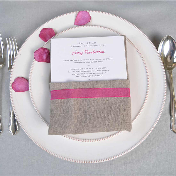 The Farringdon wedding menu cards show the descriptive text in grey and personalised names in shocking pink. 